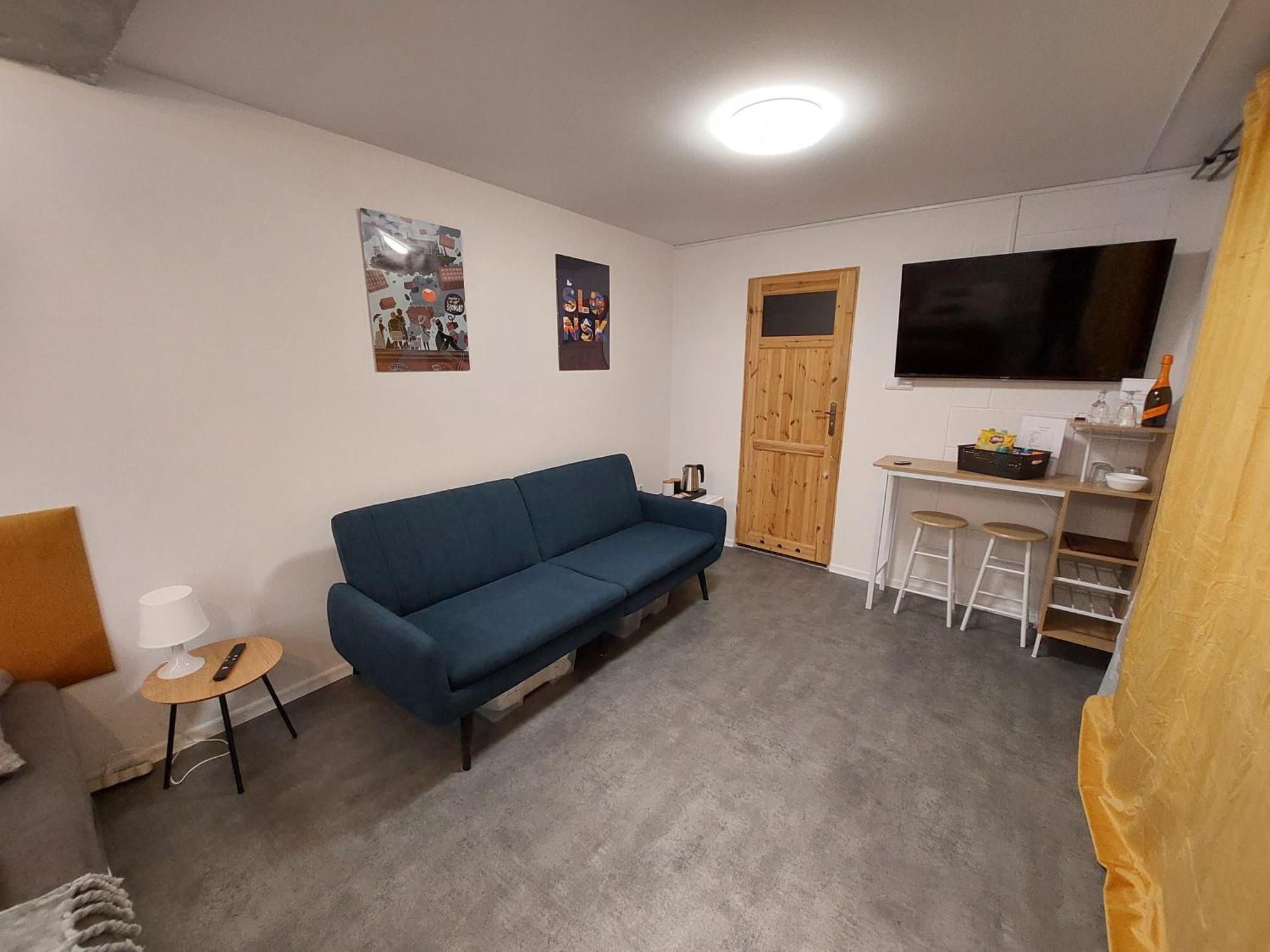 Flores Apartament Катовице Стая снимка